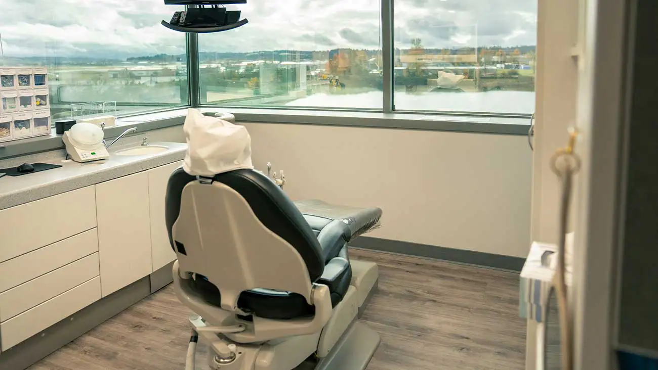 Waiting area with chairs and TV at Lakeview Dental Center in Salem, OR